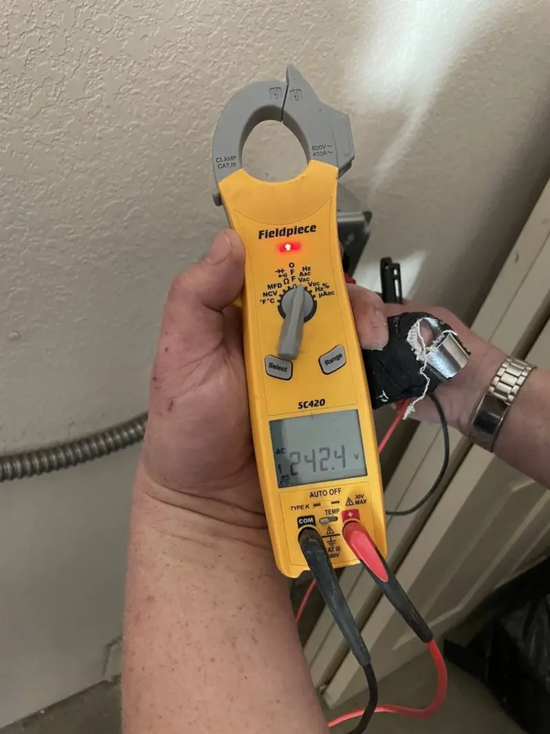 Voltage testing with clamp meter during Circuit Breaker Repair in North Platte